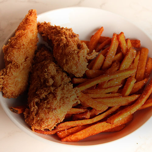 Broasted fried chicken and sweet potato fries catered by Toscana as part of Collective Brands Catering group